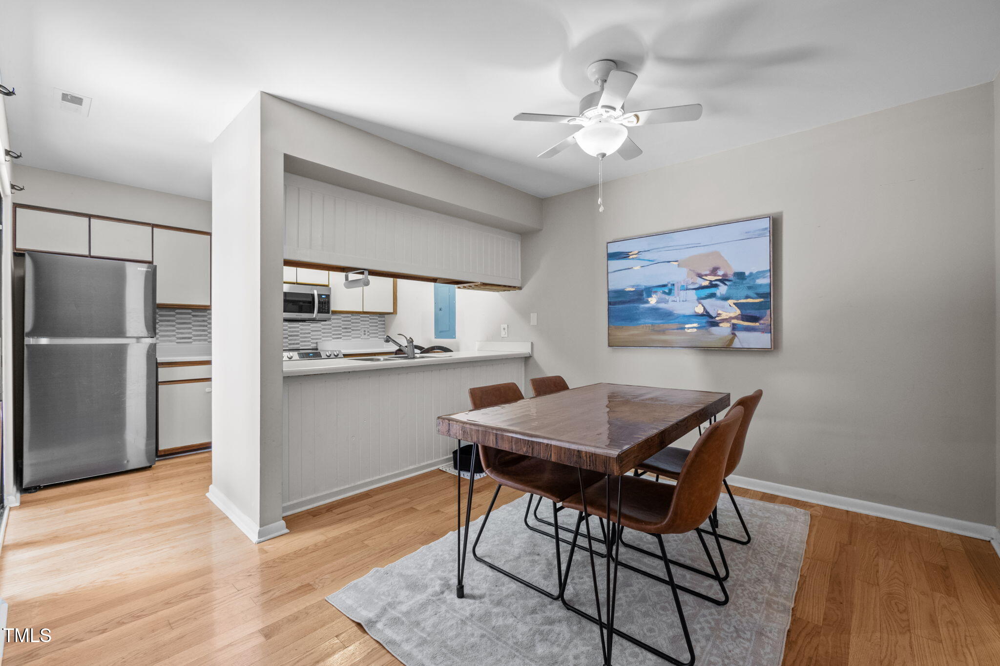 167 Springberry Lane Chapel Hill, NC 27517 - Photo 9 of 37 a view of a dining room with furniture and wooden floor
