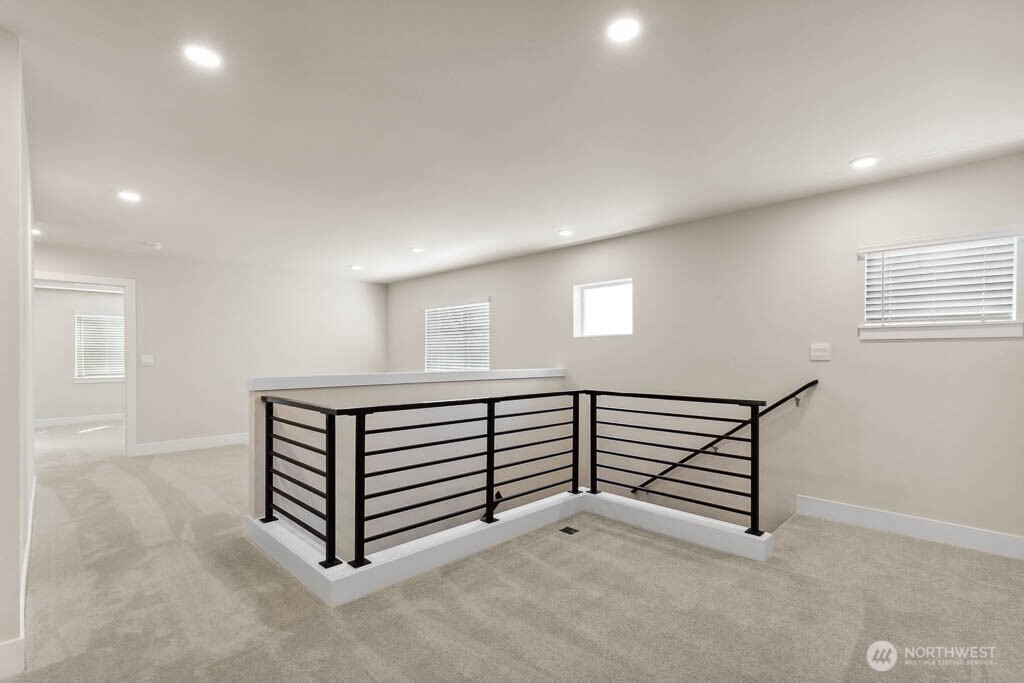 3827 194th Place Southeast Bothell, WA 98012 - Photo 16 of 34 a view of an empty room with windows