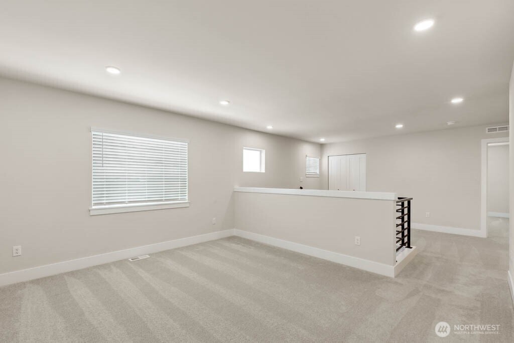 3827 194th Place Southeast Bothell, WA 98012 - Photo 18 of 34 a view of an empty room with a window