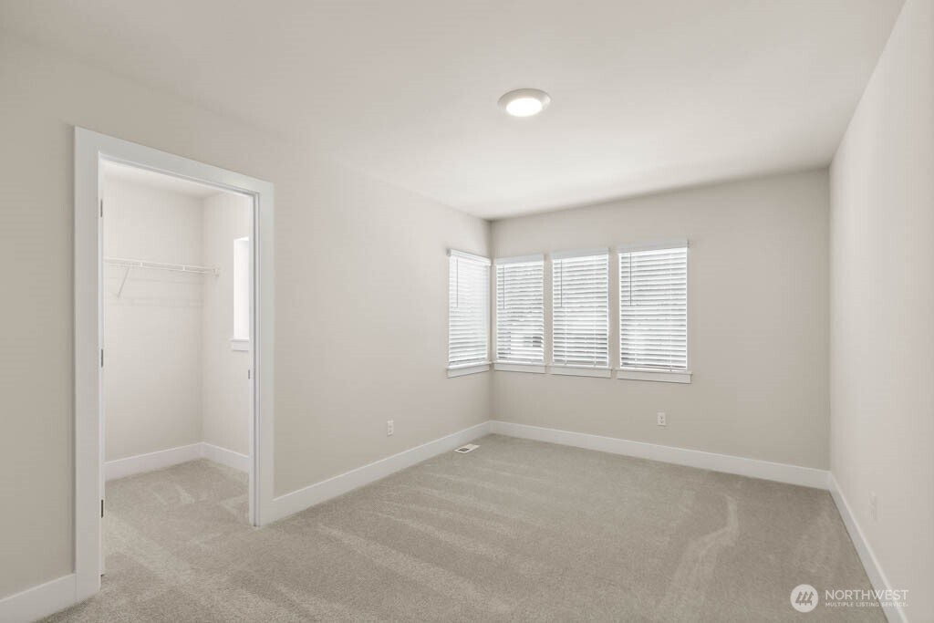 3827 194th Place Southeast Bothell, WA 98012 - Photo 26 of 34 an empty room with windows