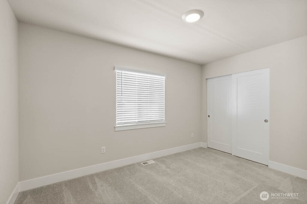 3827 194th Place Southeast Bothell, WA 98012 - Photo 30 of 34 an empty room with a window