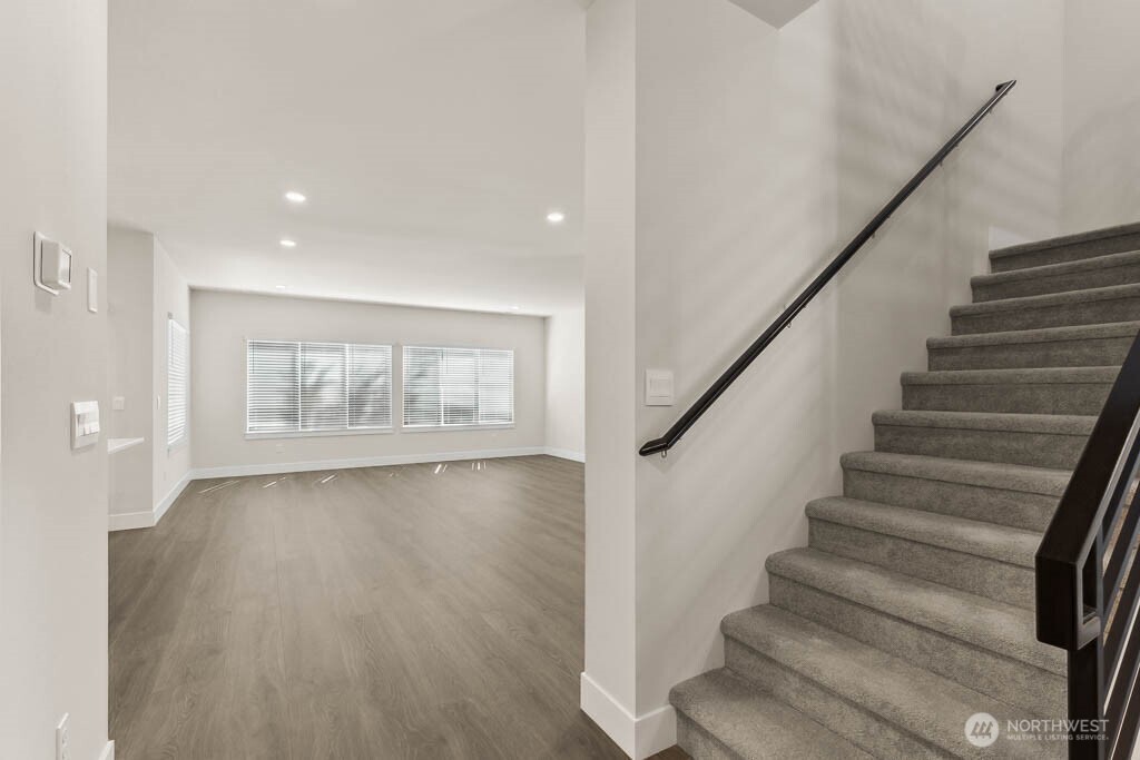 3827 194th Place Southeast Bothell, WA 98012 - Photo 6 of 34 a view of an entryway with wooden floor