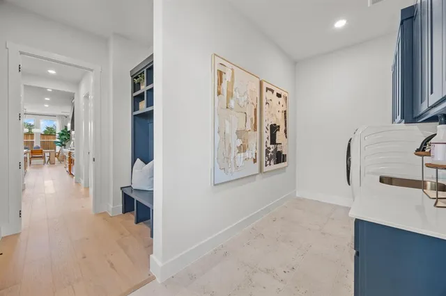 a kitchen with sink and cabinets