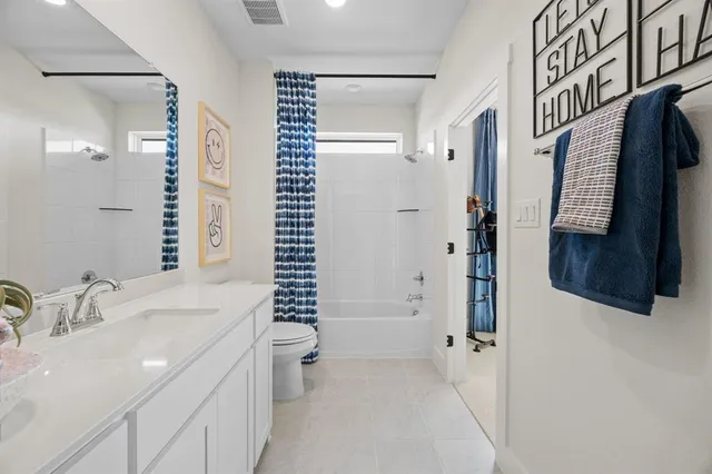 a bed room with a bed and a window