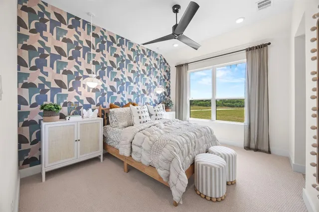 a bathroom with a sink a mirror and a toilet