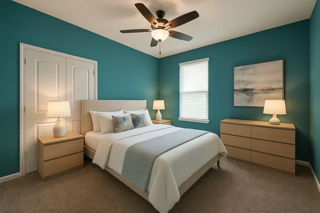 a bedroom with a bed and a ceiling fan
