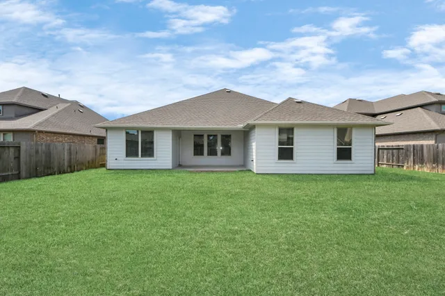 front view of a house and a yard