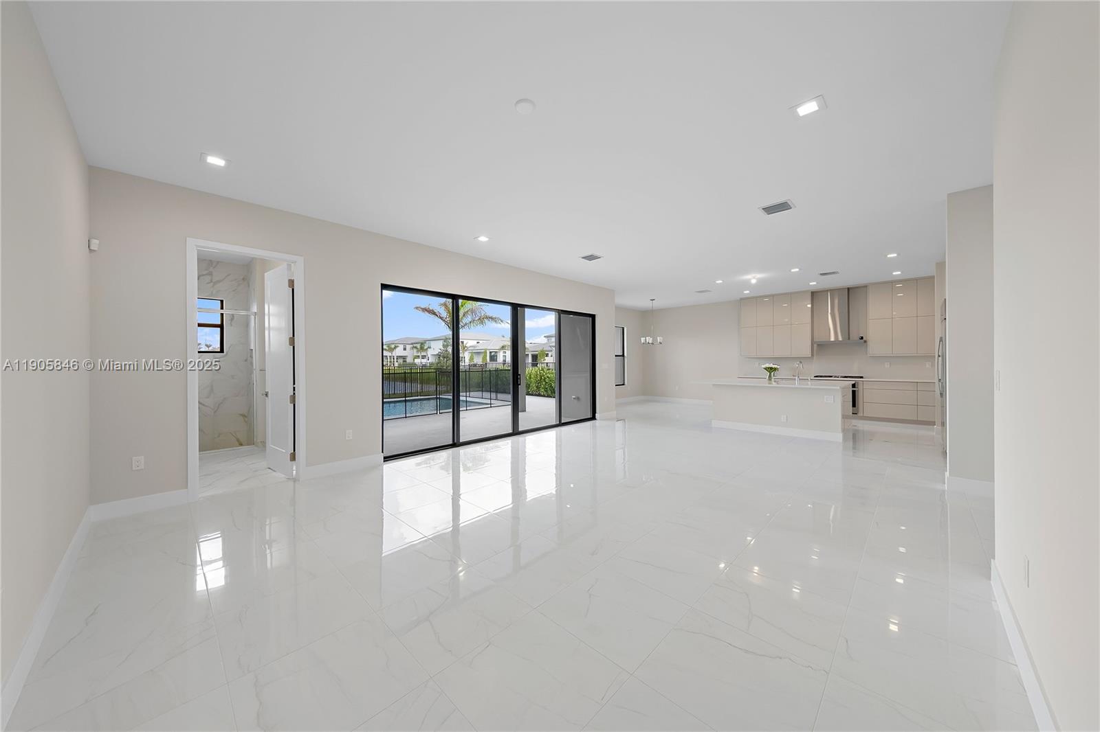 20422 Southernwood Avenue Boca Raton, FL 33434 - Photo 17 of 23 a view of an empty room with a window