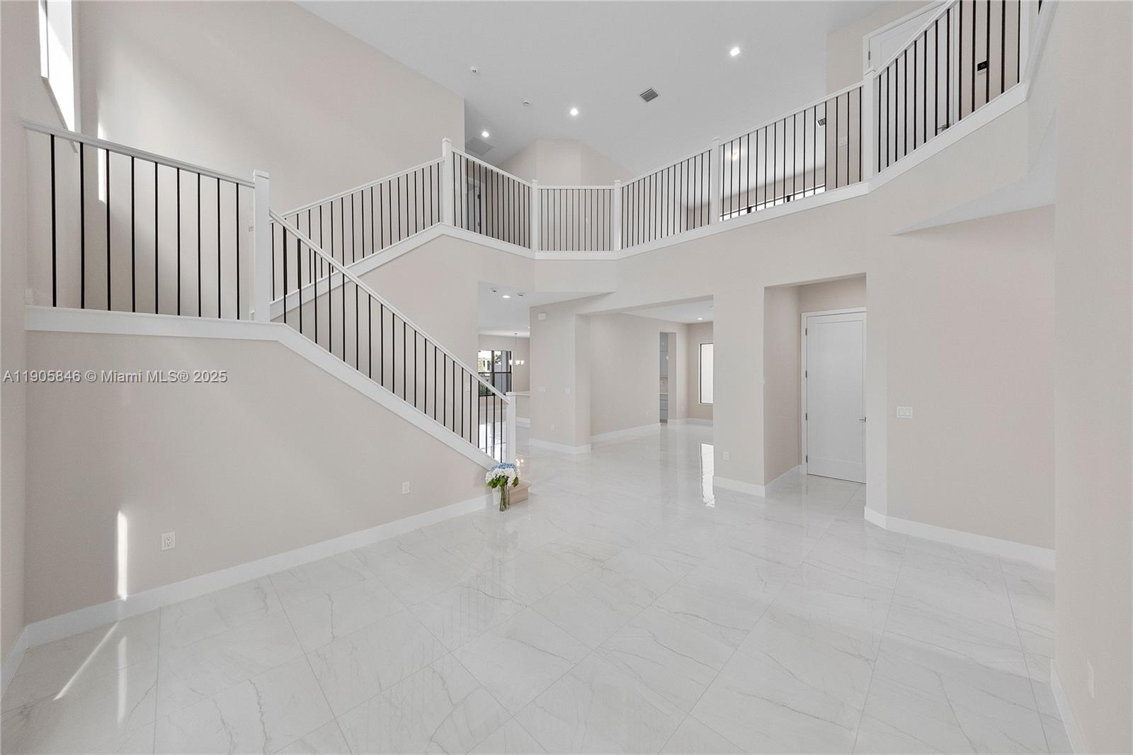 20422 Southernwood Avenue Boca Raton, FL 33434 - Photo 2 of 23 a view of an entryway with staircase