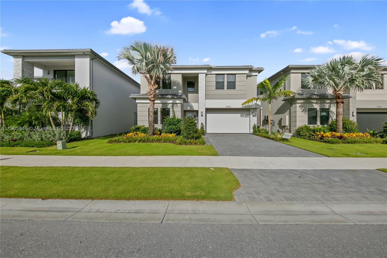 20422 Southernwood Avenue Boca Raton, FL 33434 - Photo 22 of 23 a front view of a house with garden