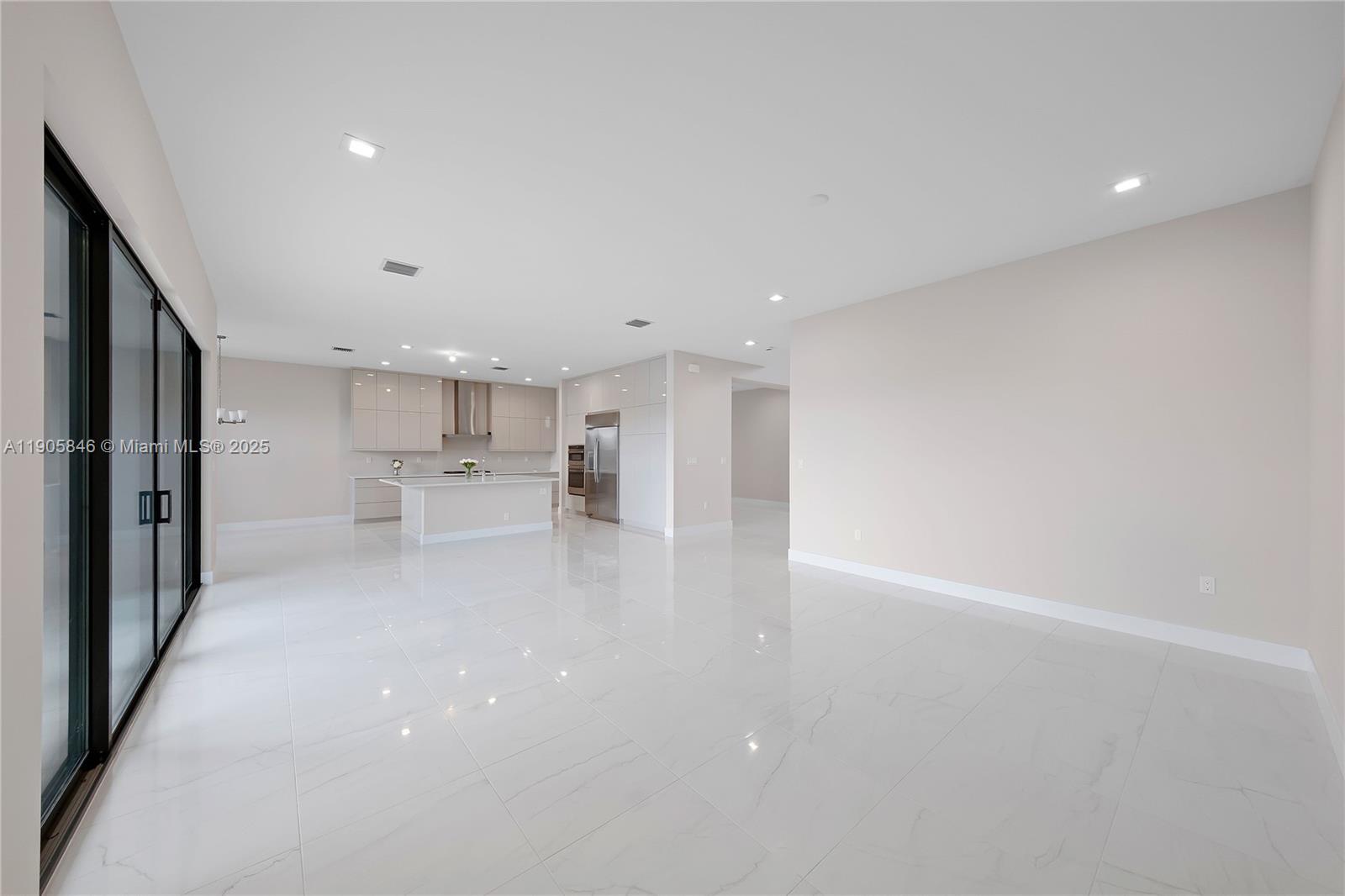 20422 Southernwood Avenue Boca Raton, FL 33434 - Photo 5 of 23 a view of kitchen with wooden floor