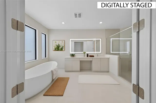 a large white kitchen with a large window