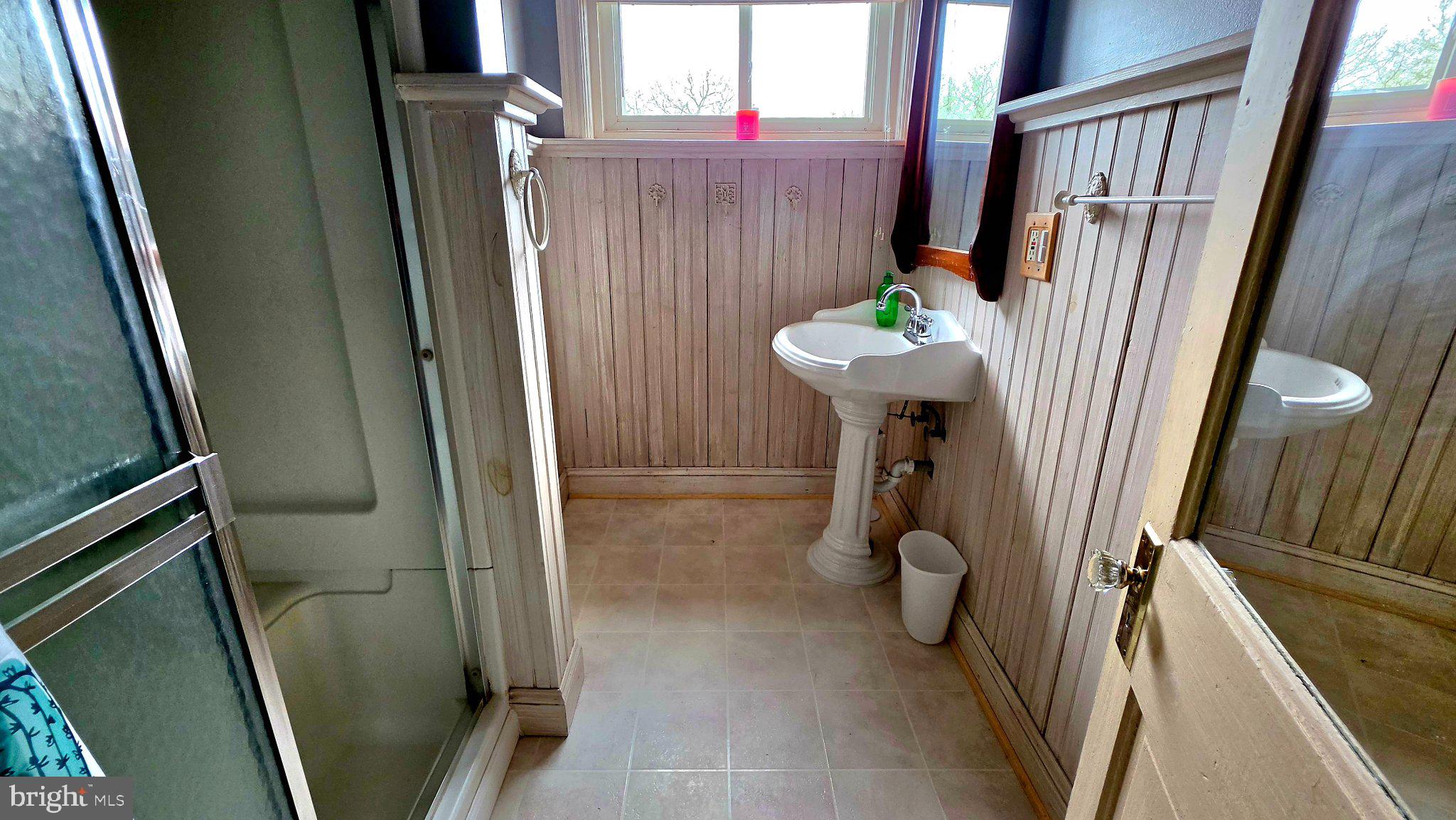 136 4th Avenue Roebling, NJ 08554 - Photo 11 of 18 a bathroom with a sink toilet and shower