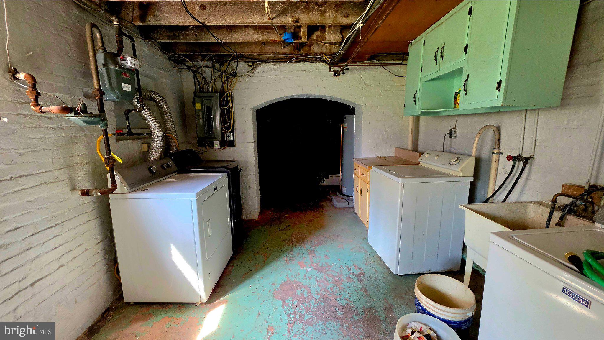 136 4th Avenue Roebling, NJ 08554 - Photo 17 of 18 a view of storage and utility room with a washer and dryer