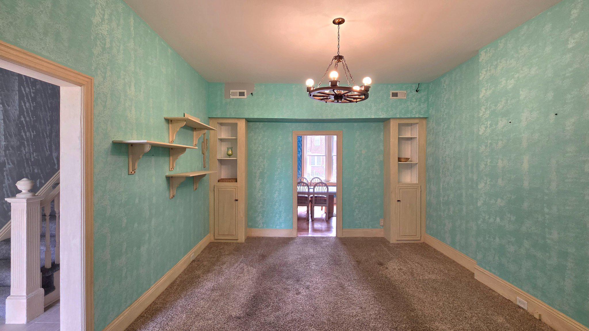 136 4th Avenue Roebling, NJ 08554 - Photo 4 of 18 a view of a livingroom with a chandelier fan and kitchen view