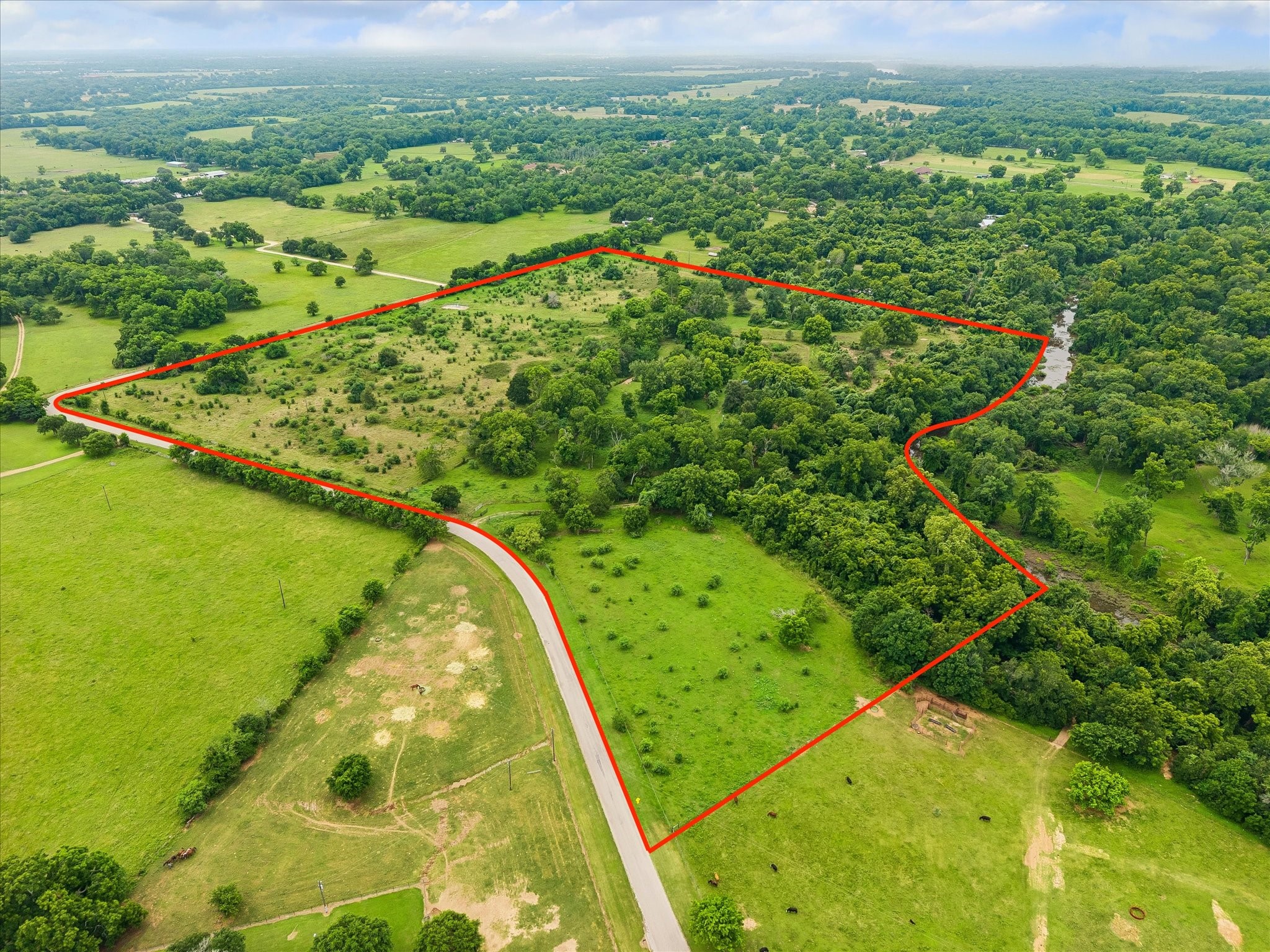 2511 Hartwell Road Pattison, TX 77423 - Photo 2 of 27 Bird's-eye view showcasing the property's boundaries, pastureland, and peaceful rural setting.