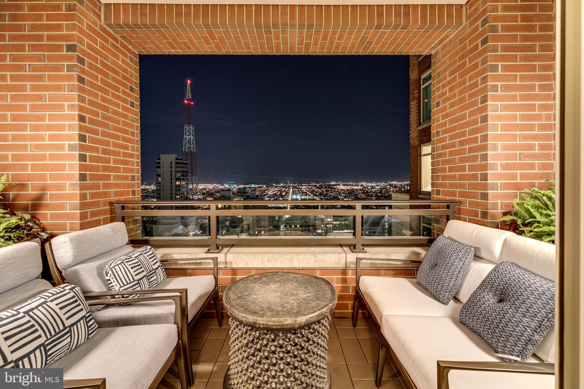 130 South 18th Street, Unit 2803 Philadelphia, PA 19103 - Photo 11 of 32 a living room with furniture and a fireplace