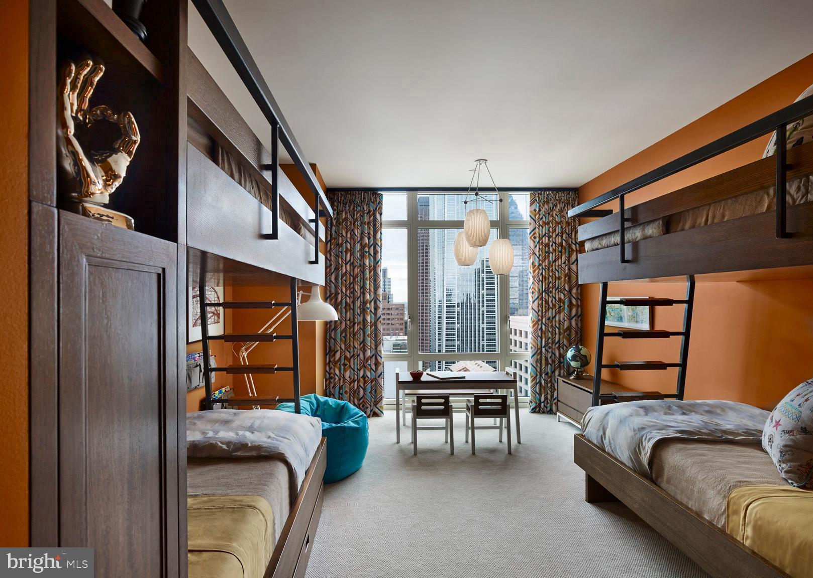 130 South 18th Street, Unit 2803 Philadelphia, PA 19103 - Photo 22 of 32 a bedroom with furniture and a window