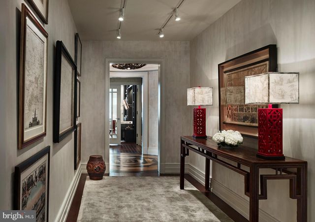 a view of living room with furniture and flat screen tv