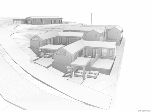 a view of a backyard with a tree