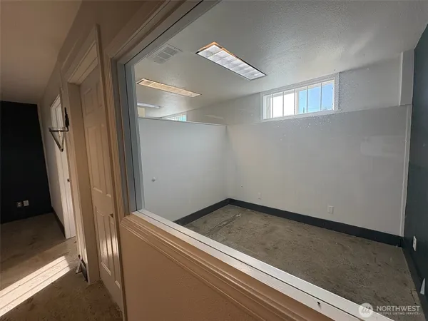 a view of small space with wooden floor