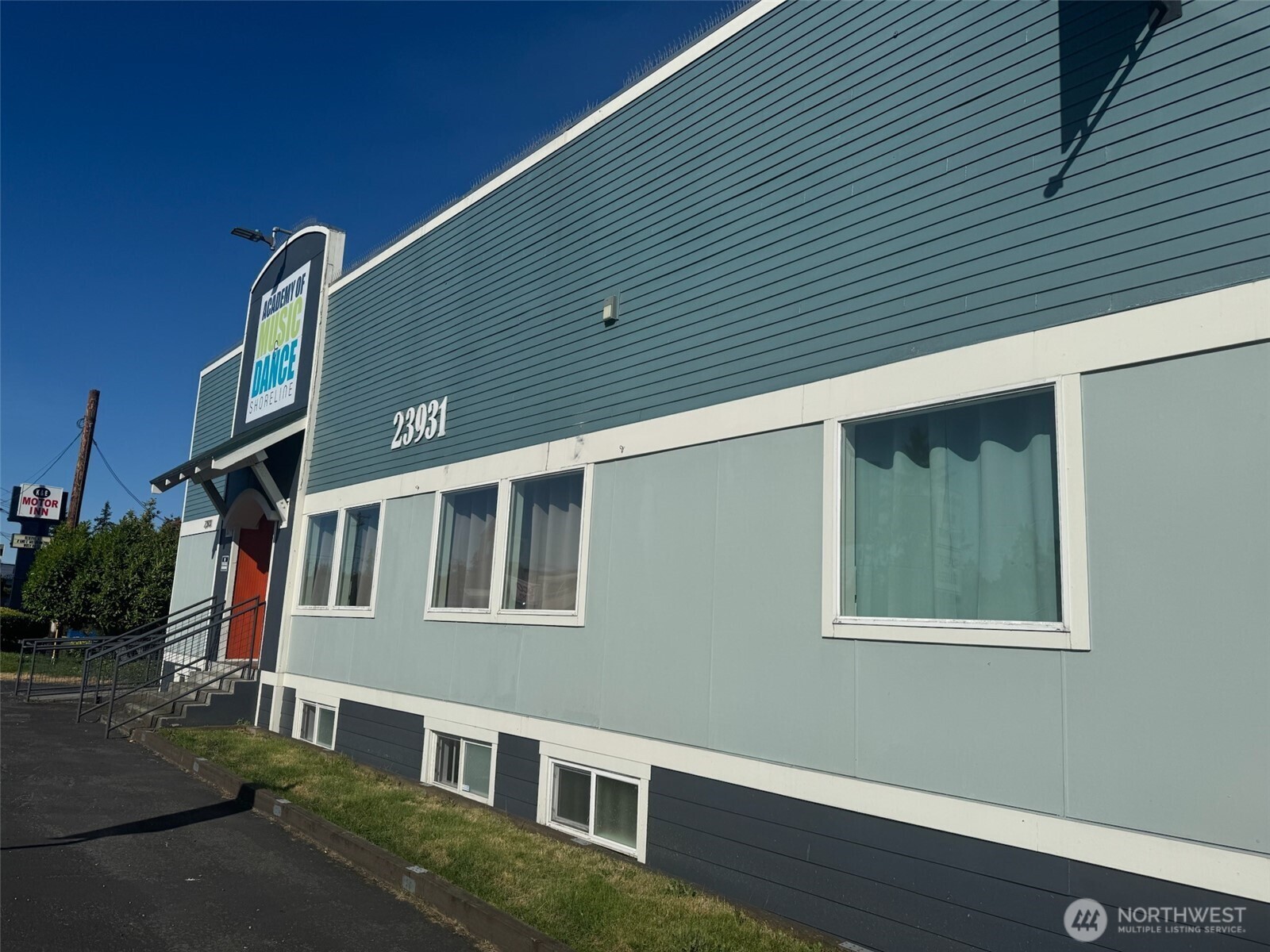 23931 Highway 99, Unit 102 Edmonds, WA 98026 - Photo 17 of 19 a front view of a house with a garage