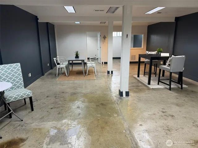 a view of an empty room with shelves