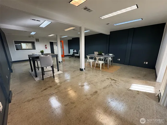 a view of a dining room with furniture