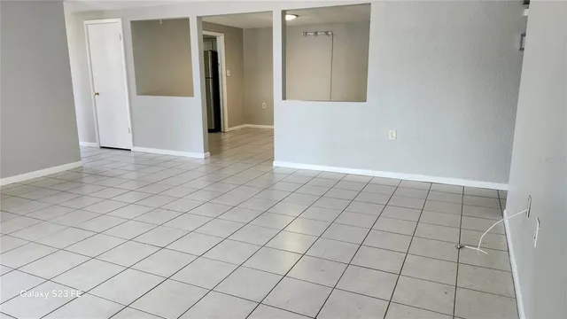 a bathroom with a vanity and a mirror