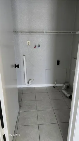 a bathroom with a toilet and a bathtub
