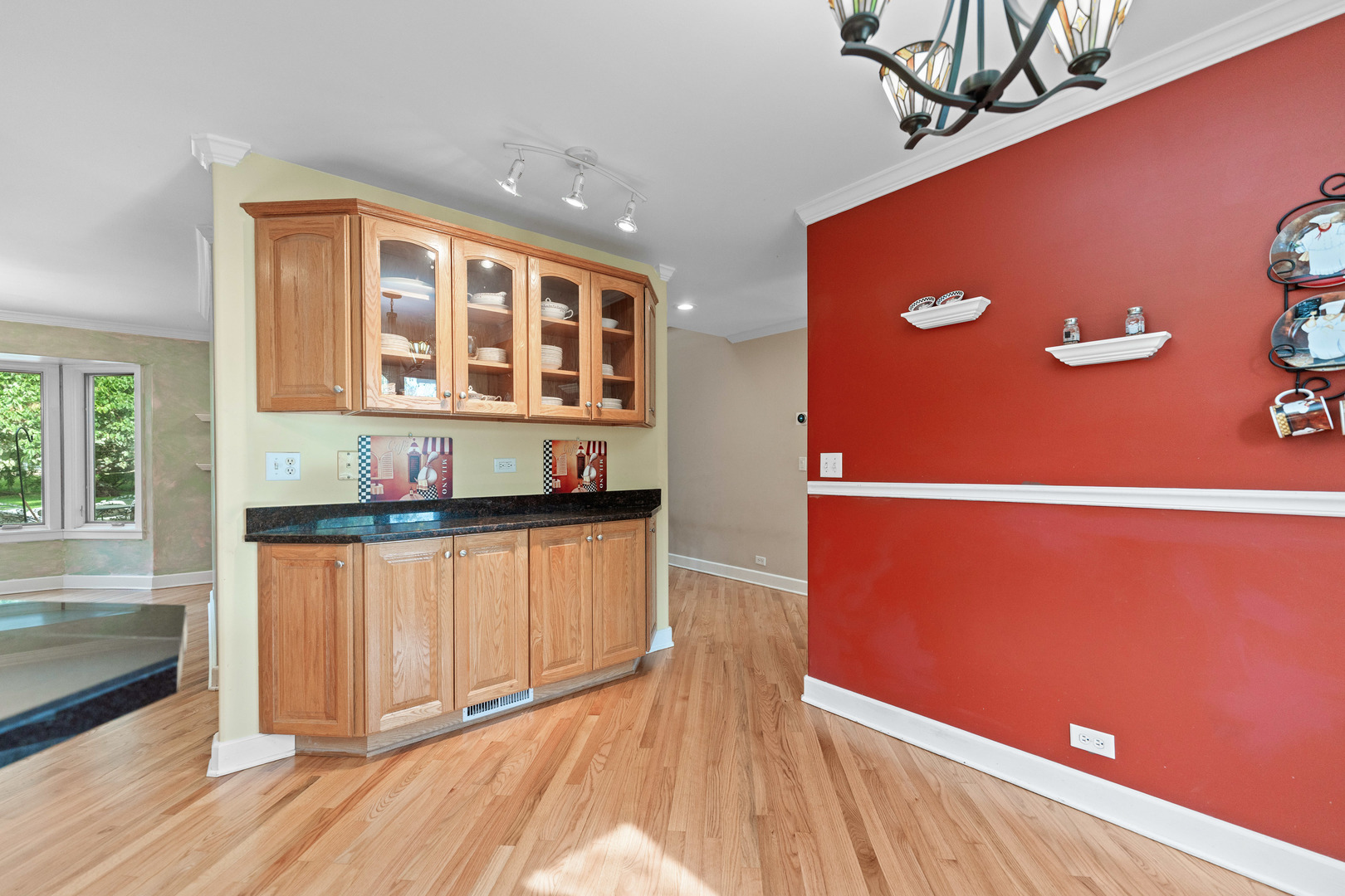 23W620 Walnut Street Roselle, IL 60172 - Photo 11 of 71 a view of a livingroom with furniture and wooden floor
