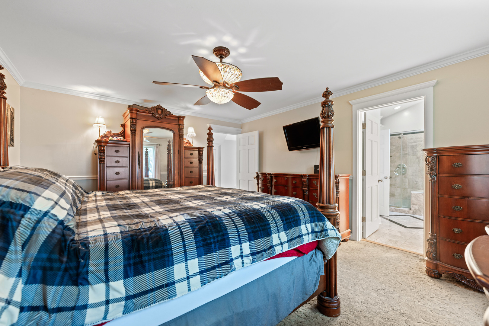 23W620 Walnut Street Roselle, IL 60172 - Photo 25 of 71 a bedroom with a bed and a chandelier