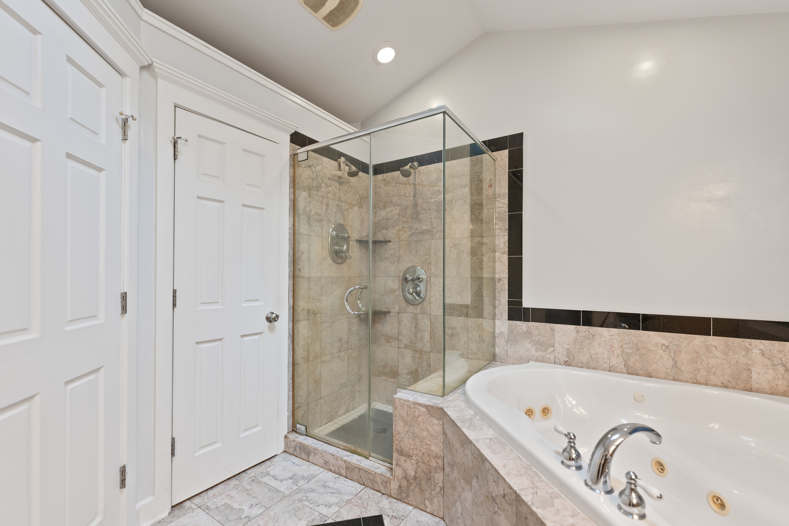 23W620 Walnut Street Roselle, IL 60172 - Photo 28 of 71 a bathroom with a bathtub and a shower