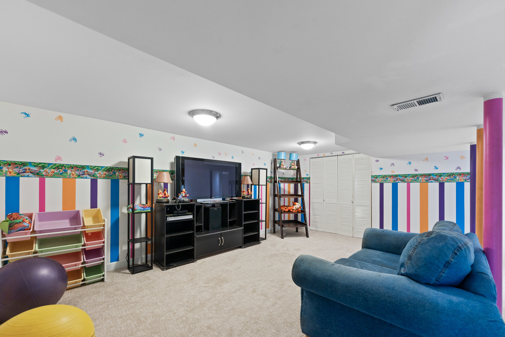 23W620 Walnut Street Roselle, IL 60172 - Photo 42 of 71 a living room with furniture and a book shelf