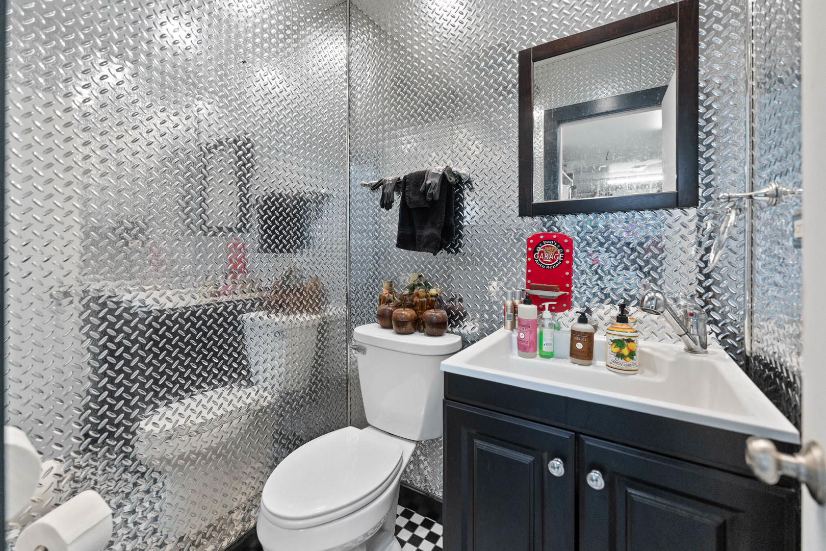 23W620 Walnut Street Roselle, IL 60172 - Photo 50 of 71 a bathroom with a sink vanity mirror and toilet