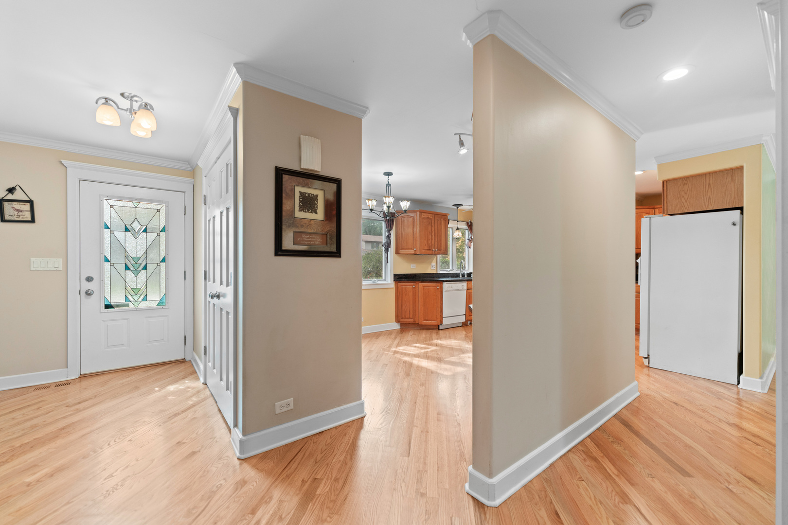23W620 Walnut Street Roselle, IL 60172 - Photo 8 of 71 a view of a kitchen from a hallway