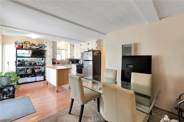 a bedroom with bed and a window