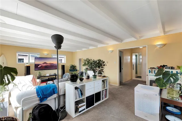 a view of a chairs and table in the patio