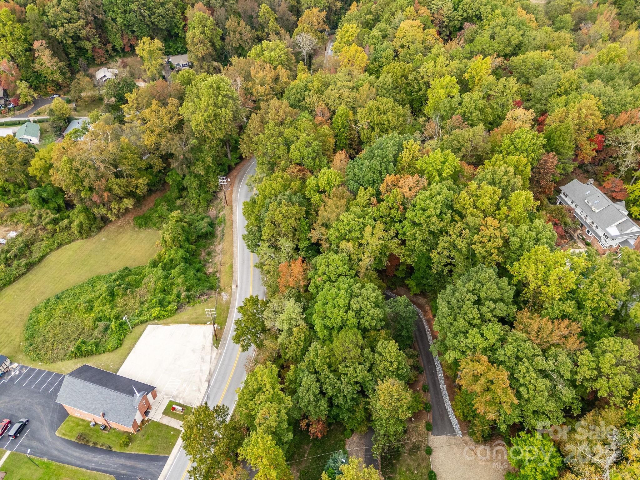 0 Fox Trot Lane Tryon, NC 28782 - Photo 12 of 20 an aerial view of residential houses with outdoor space