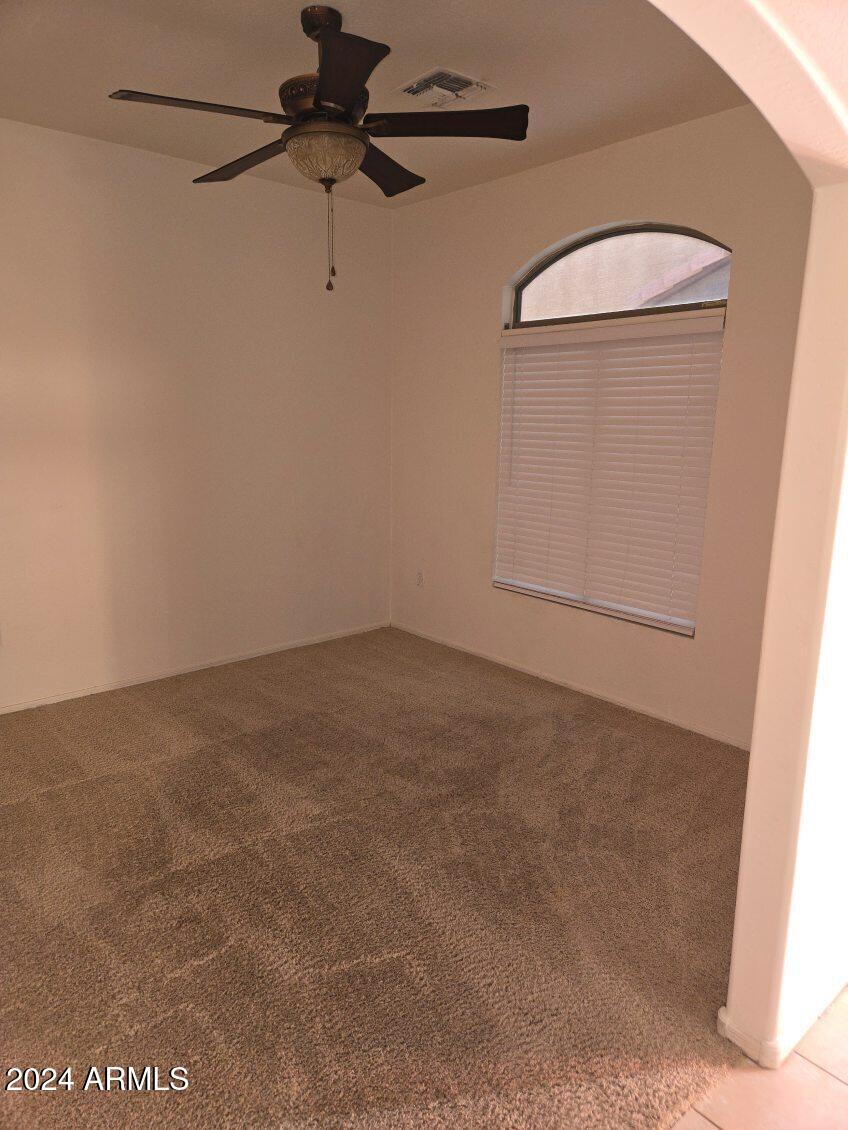 17365 North Cave Creek Road, Unit 114 Phoenix, AZ 85032 - Photo 11 of 18 a view of a room with an empty space