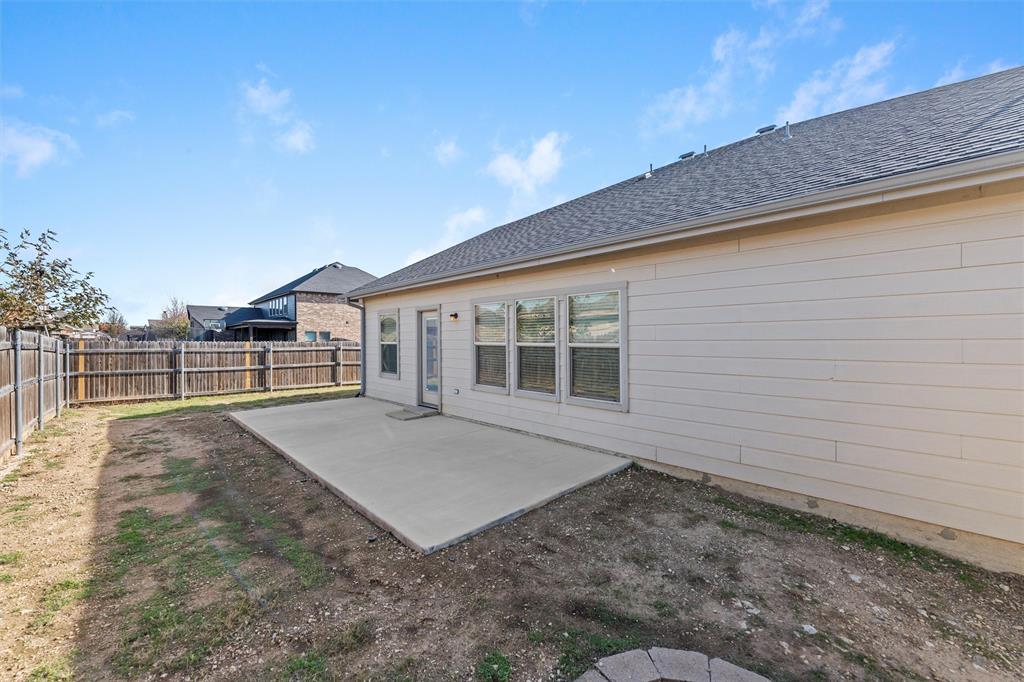 500 Braewick Drive Fort Worth, TX 76131 - Photo 32 of 35 a view of house with backyard and deck