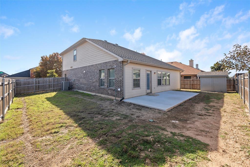 500 Braewick Drive Fort Worth, TX 76131 - Photo 35 of 35 a front view of a house with a yard
