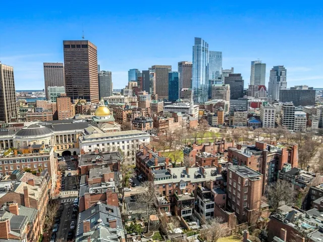 an aerial view of a city with lots of residential buildings