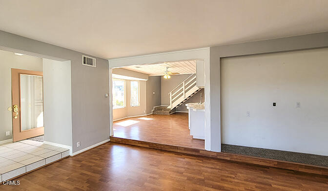 4905 Catamaran Street Oxnard, CA 93035 - Photo 3 of 14 a view of a room with wooden floor and a window