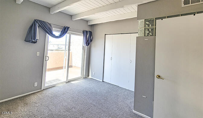 4905 Catamaran Street Oxnard, CA 93035 - Photo 10 of 14 a bathroom with a mirror and a shower