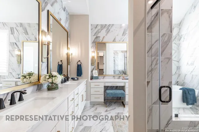a bathroom with a tub sink and mirror