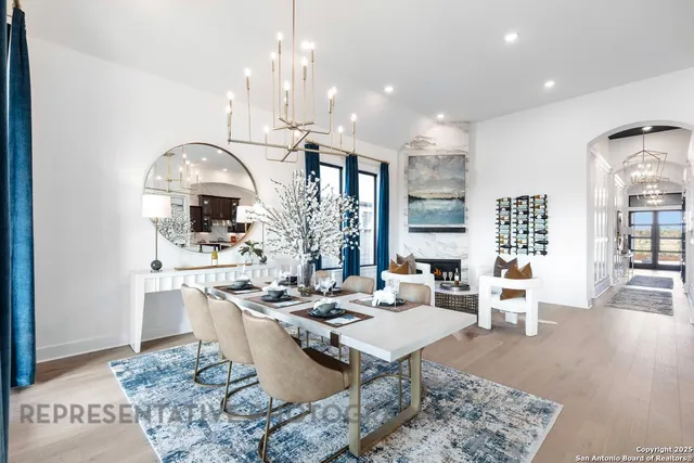 a kitchen with stainless steel appliances kitchen island granite countertop a sink and a stove