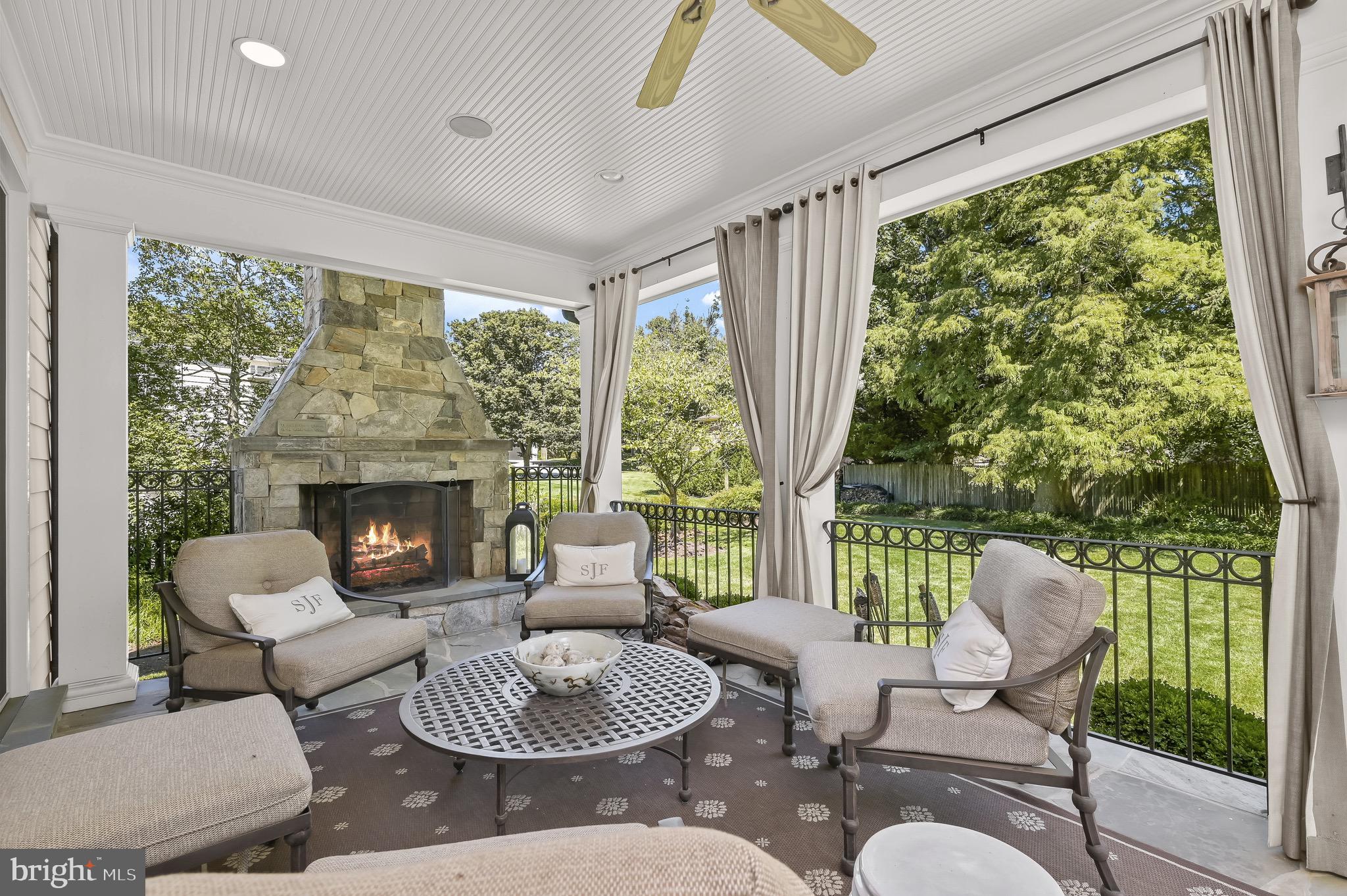 6939 Greentree Road Bethesda, MD 20817 - Photo 42 of 54 Covered Patio with Fireplace