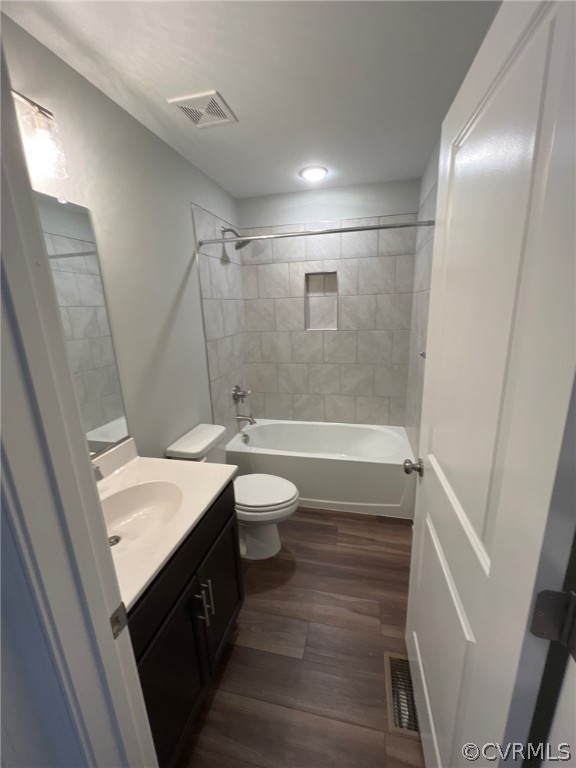 3839 Three Chopt Road Gum Spring, VA 23065 - Photo 15 of 15 a bathroom with a double vanity sink toilet and shower