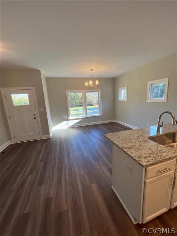 3839 Three Chopt Road Gum Spring, VA 23065 - Photo 7 of 15 wooden floor in an empty room with a window